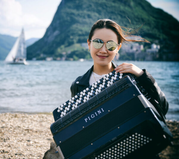 Hanzhi Wang with Accordion by the sea