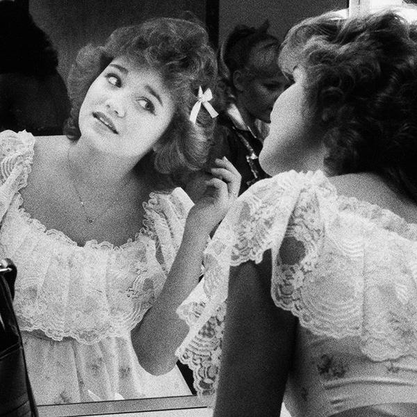 Kristen Chenoweth looking in mirror in 1984