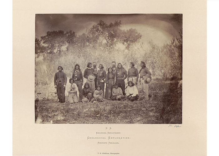 A vintage photograph of an indigenous American group.