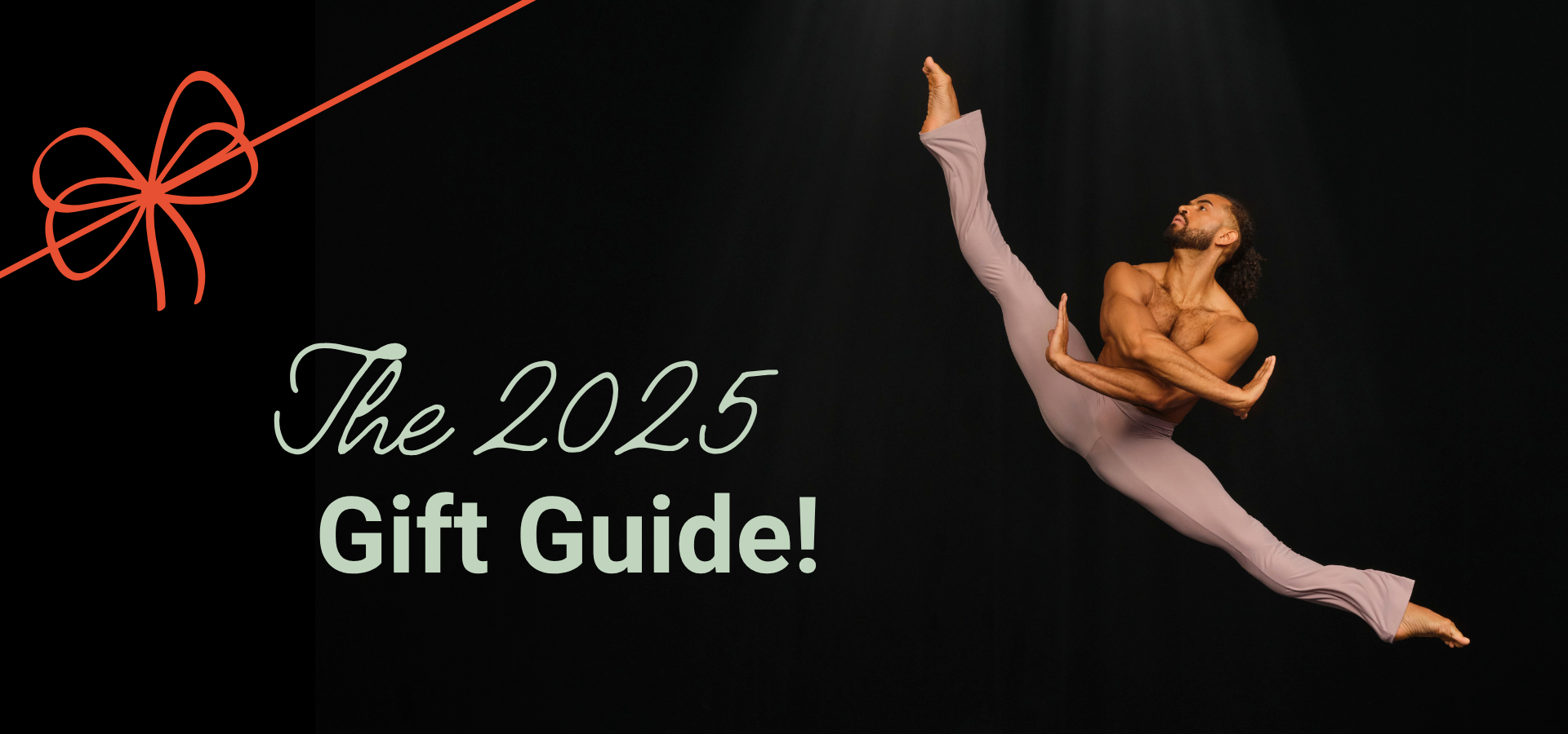 Image of the words 2025 Gift Guide with an Alvin Ailey American Dance Theater male dancer in mid leap on a black background and a red bow in the upper left corner