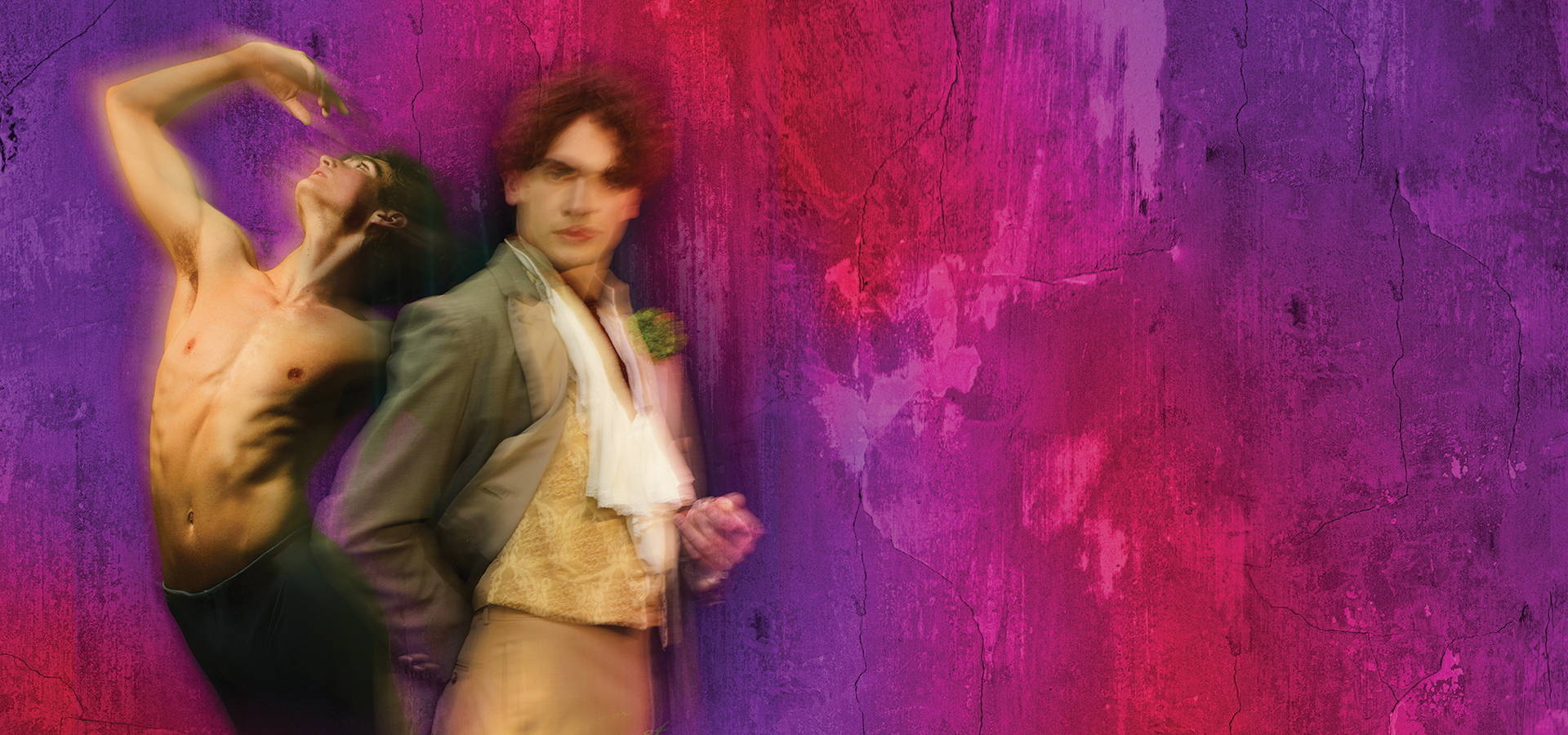 Two men -- one dancer shirtless in a dance pose and one dressed in late 1800s dress -- next to each other against a colorful red and purple background.