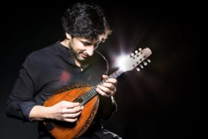 Avi Avital playing mandolin