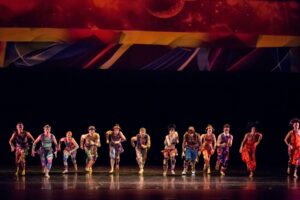 Dancers perform a routine choreographed by Twyla Tharp.