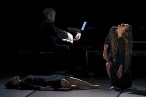 Two women perform interpretive dance to Olivier Messiaen's Harawi