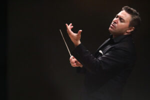 Maxim Vengerov passionately conducting.