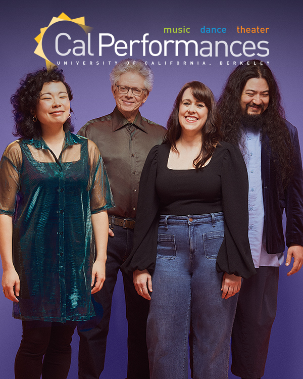 The four members of the Kronos Quartet, two men and two women, wear stand and smile in front of a purple background.