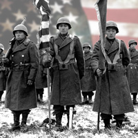 In a still image from Story Boldly's Defining Courage film, Nisei soldiers stand solemnly in a field, holding flags and rifles with an American Flag superimposed in the sky behind.