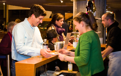 Patrons ordering concessions from Café Zellerbach staff